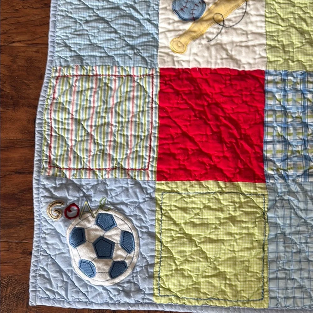 Varsity Baby Quilt with Red and Yellow Accents. Home quilted